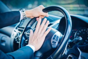 Man driving a car aggressively