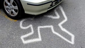 chalk outline under a car