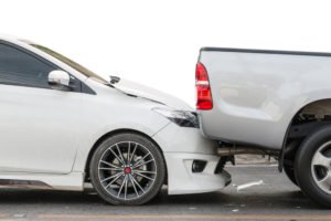 white car silver truck rear-end accident