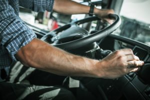 close-up of truck driver driving