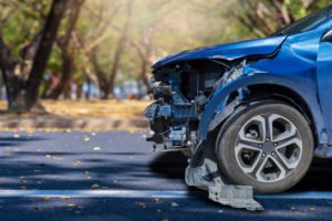 smashed-up blue car