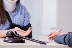 injured client consults with attorney