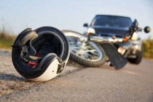 motorcycle in the road after traffic accident