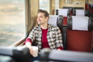 train passenger looks out the window