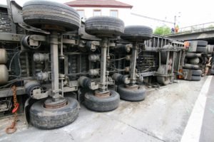 truck on its side after a crash