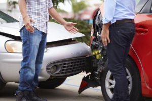 two drivers argue after a collision