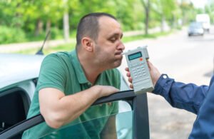 drunk-man-taking-dui-breath-test