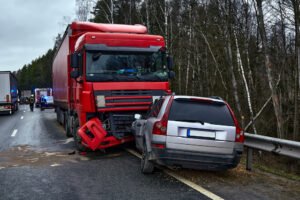 Truck head on collision with a car