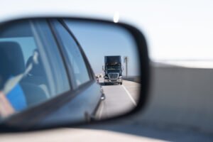 Truck in rear-view mirror