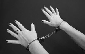 Female hands in handcuffs